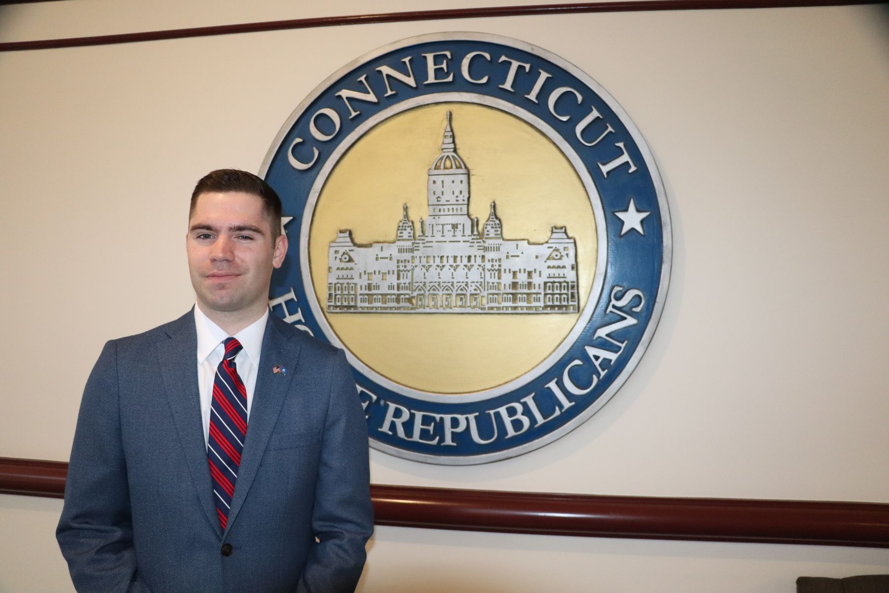 Matthew Keatley, legislative intern, stands nears the offices of the Connecticut House Republicans.